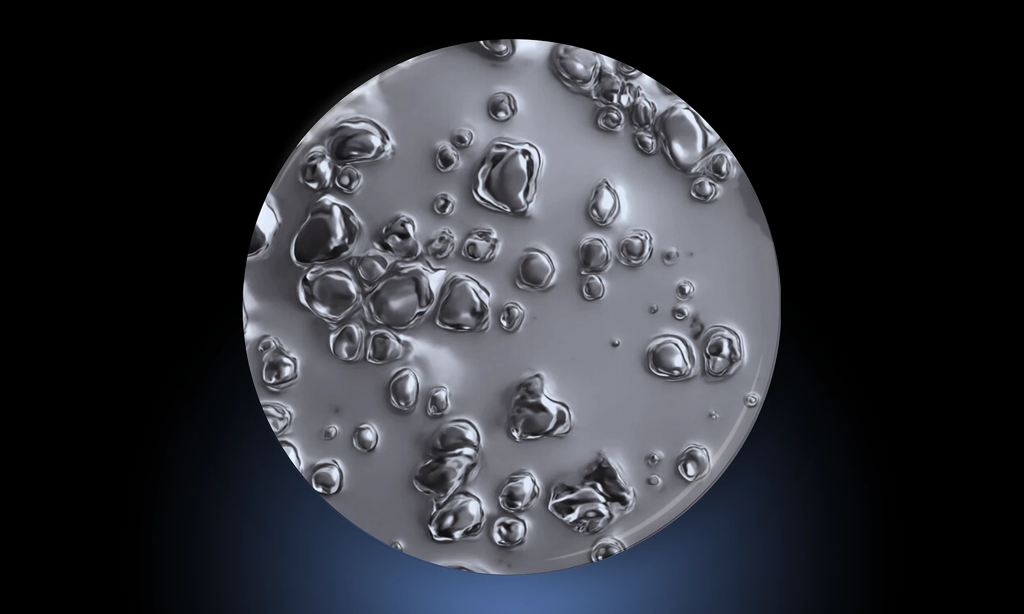 Microscopic image of a circular organoid grown from cells of a tumor shown in grey with a black background and blue light emanating from the bottom.